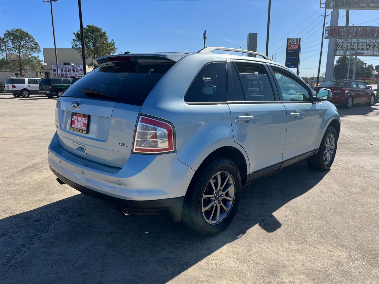 2008 blue /black Ford Edge SEL FWD (2FMDK38C98B) with an 3.5L V6 DOHC 24V engine, 6-Speed Automatic Overdrive transmission, located at 14700 Tomball Parkway 249, Houston, TX, 77086, (281) 444-2200, 29.928619, -95.504074 - Photo#6